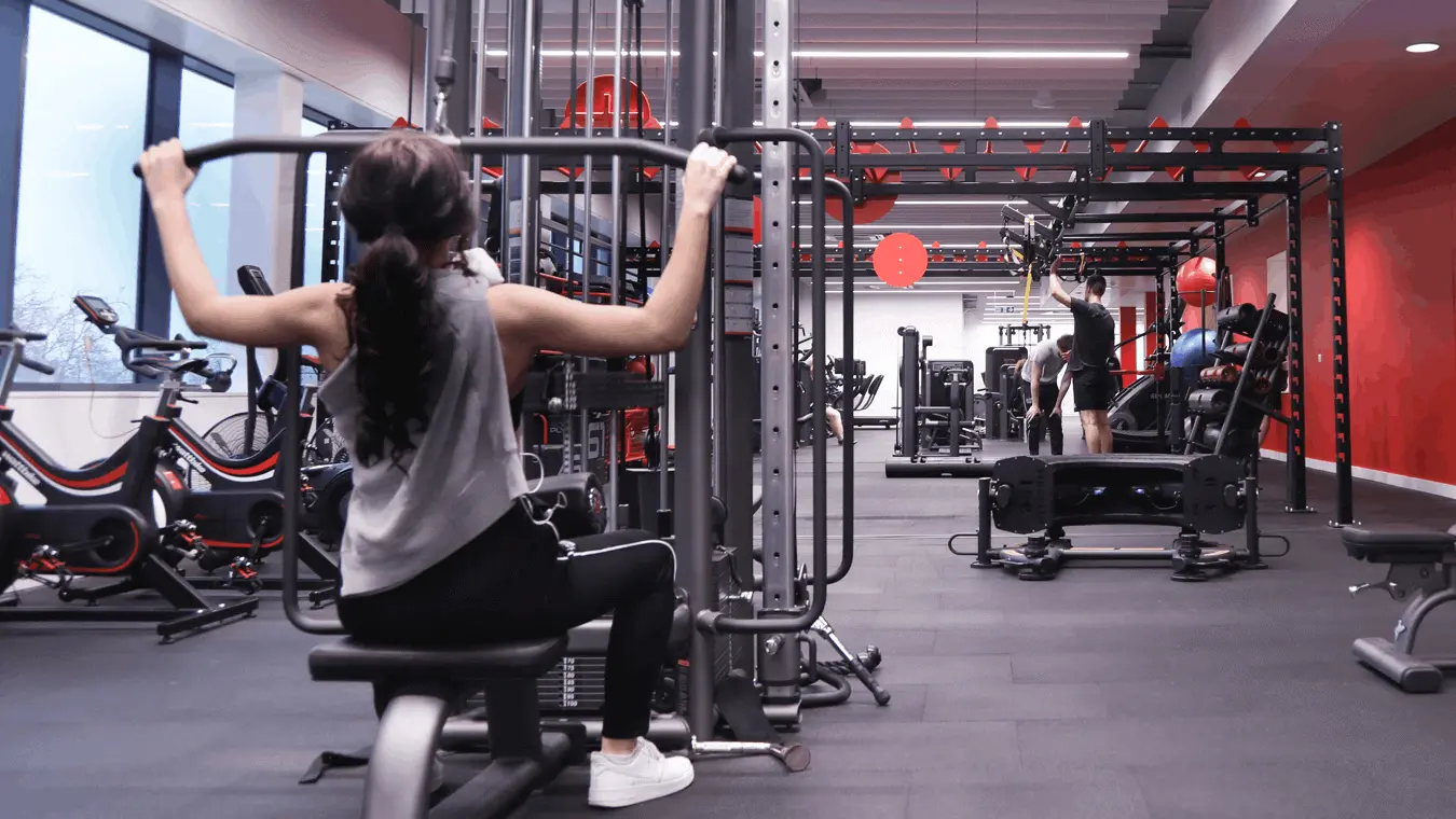 People using the gym equipment