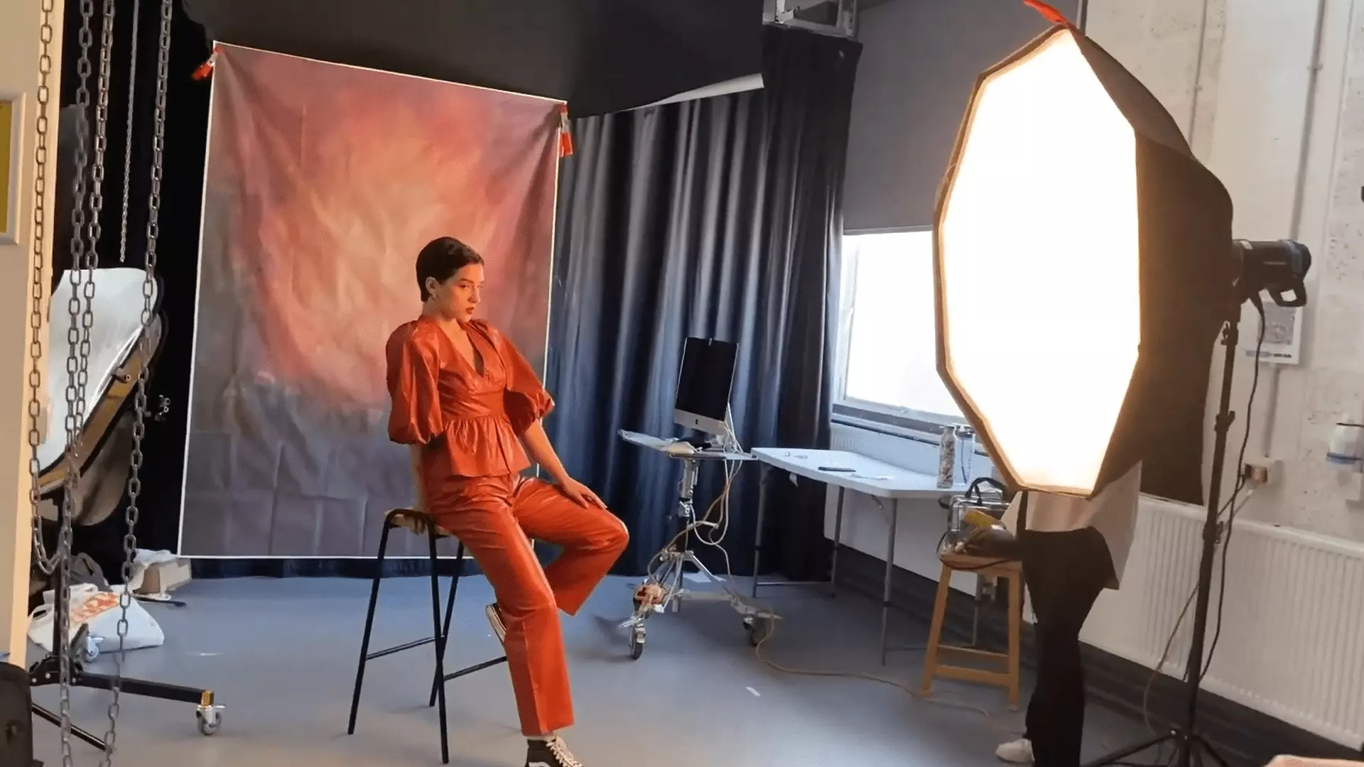 A video thumbnail of photoshoot with fashion styling students