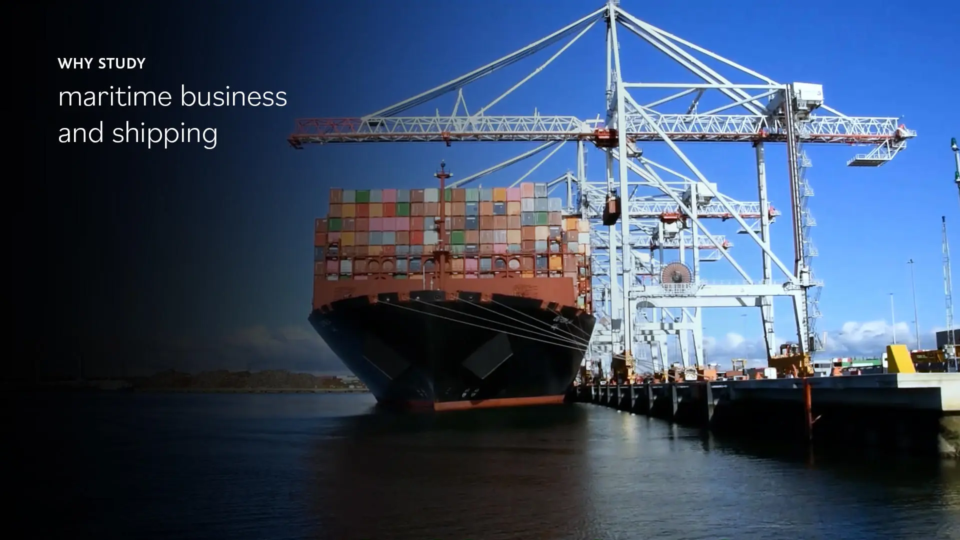 Image of a large cargo ship with many ship containers aboard. 