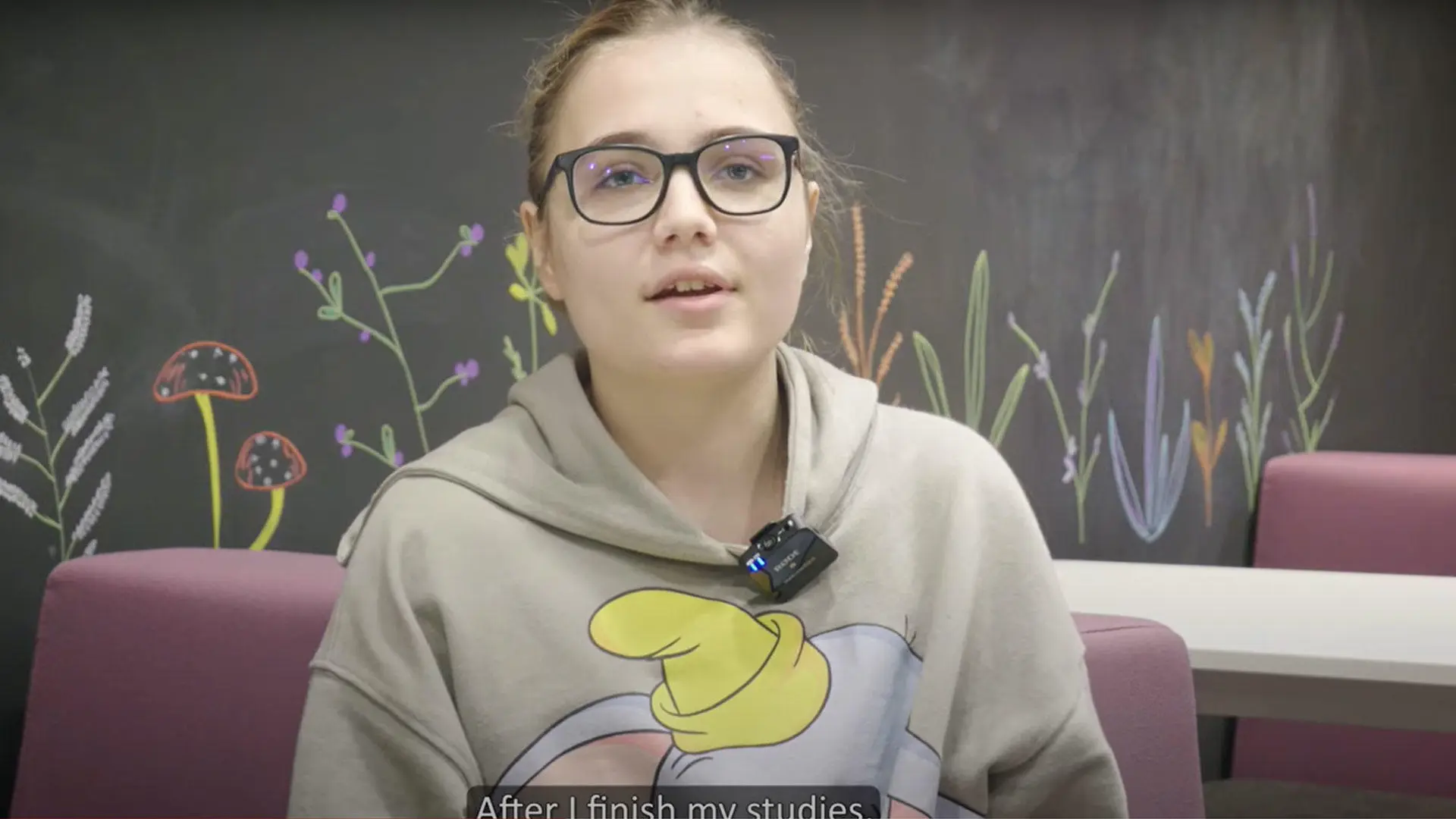 Still from the video showing student, Ana talking to camera.