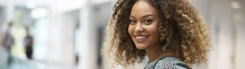 A female student looking at the camera