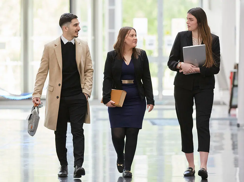 The business people walking through the spark