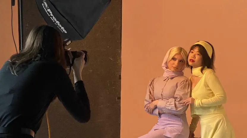 Fashion models in front of a camera