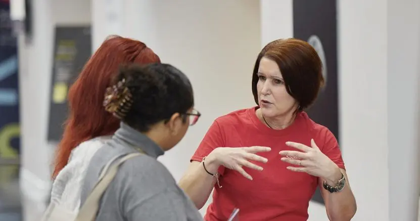 Solent staff member talking to a student