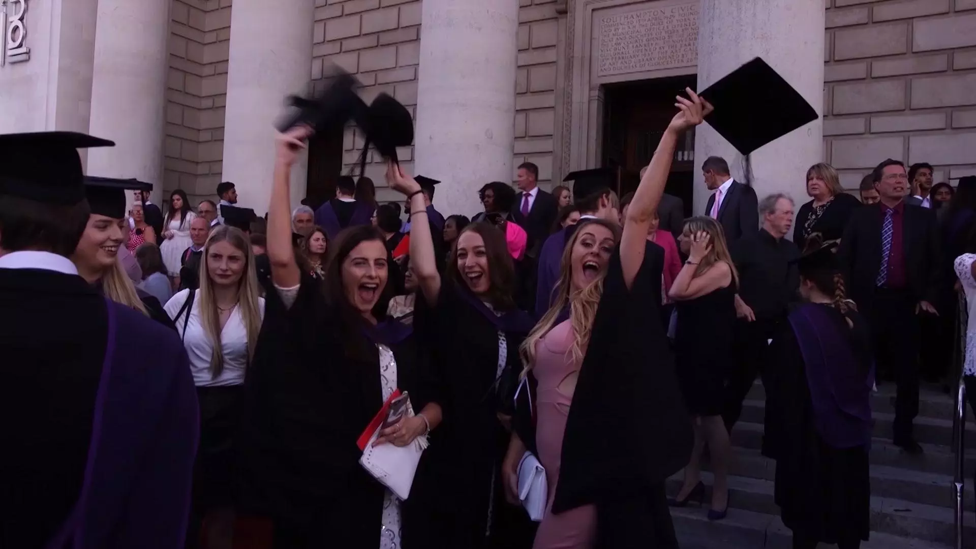 A video thumbnail of Solent graduates throwing their mortarboards in the air