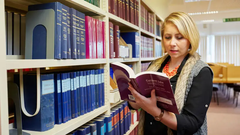 Law student in the law library