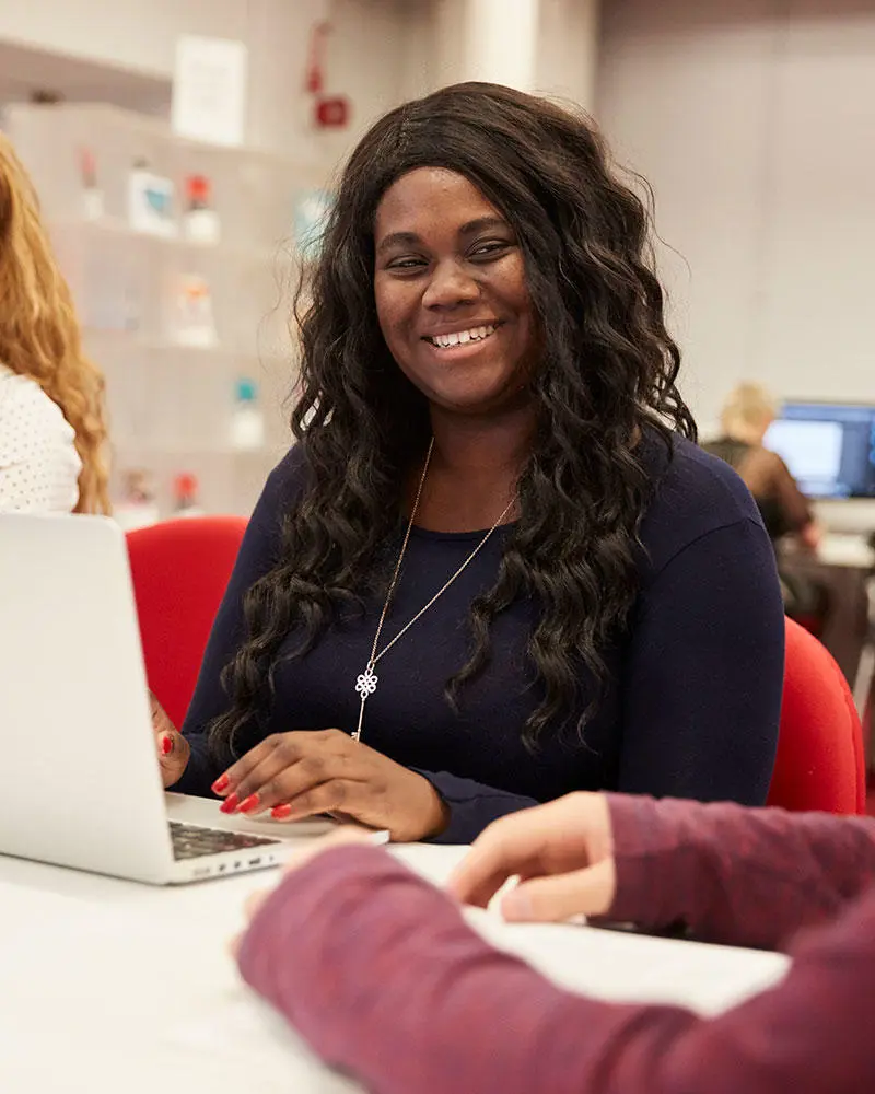 A female student looking at the camera