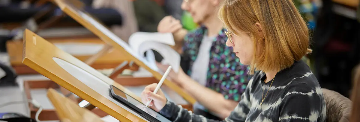 Image of students working in the animation studio