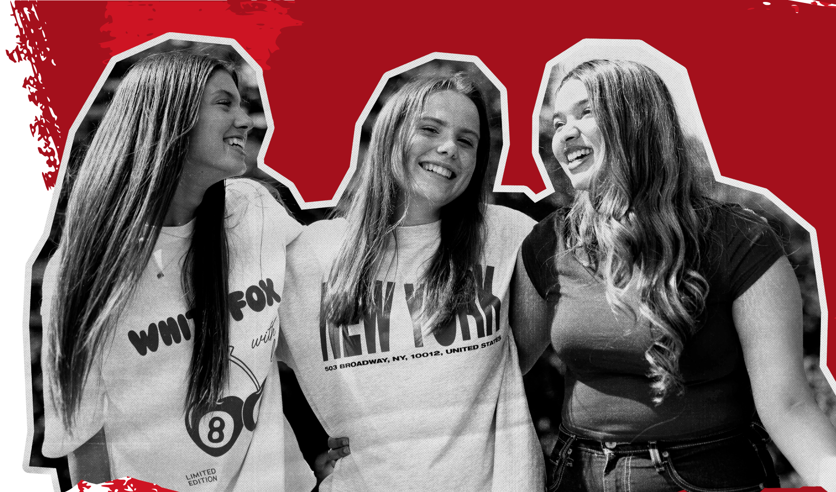 Three girls smiling and embracing