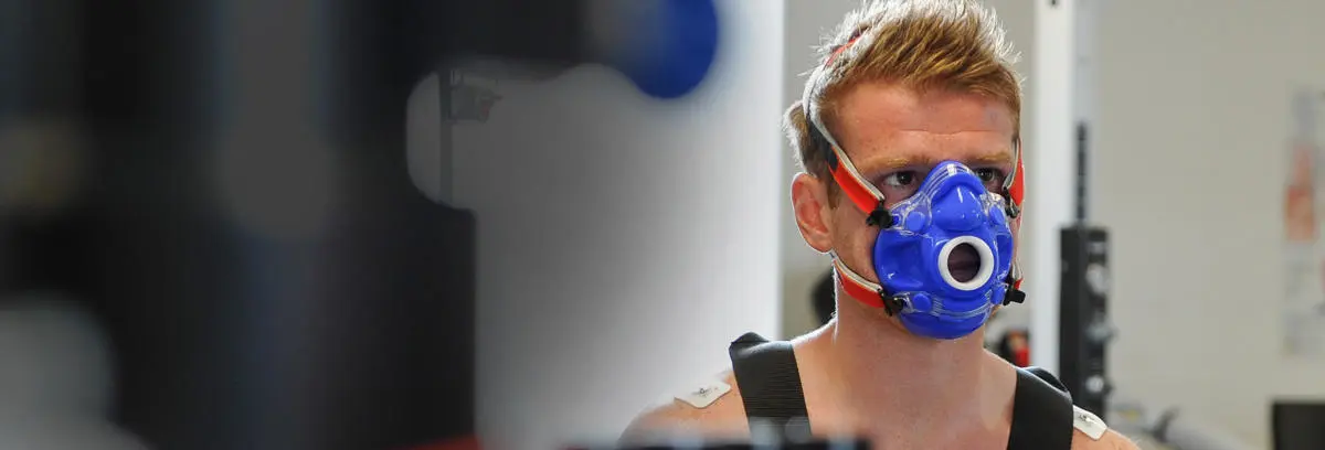 A person wearing a vo2max mask
