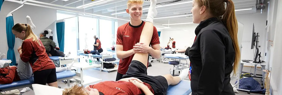 Students working in sport therapy suite