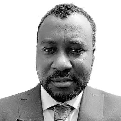 Headshot of Shehu Yusha’u