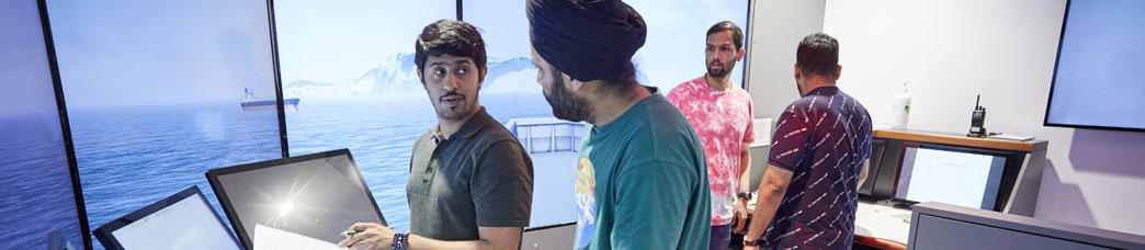 Officer of the Watch students in the bridge simulator