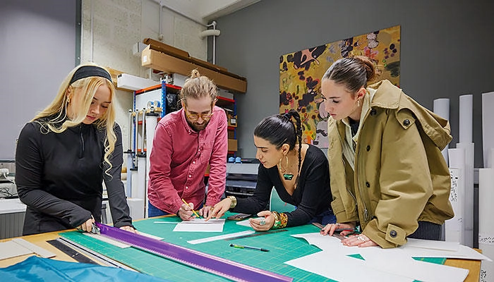 Art students working on a project in the studio