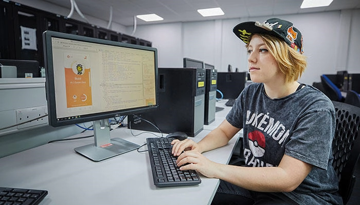 A computing student working on a project