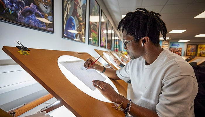 An animation student working in the studio