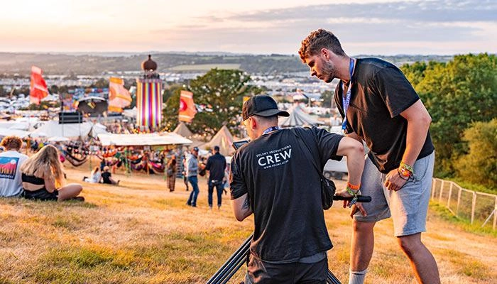 Film and tv students filming at a festival
