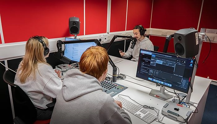 Sports journalism students using the radio studios