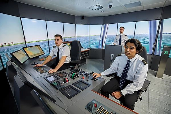 Deck cadets using the bridge simulator