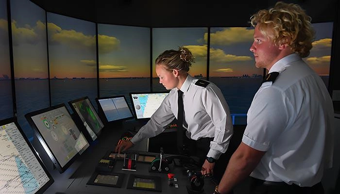 Deck cadets using the bridge simulator