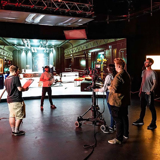 Students on a movie set filming