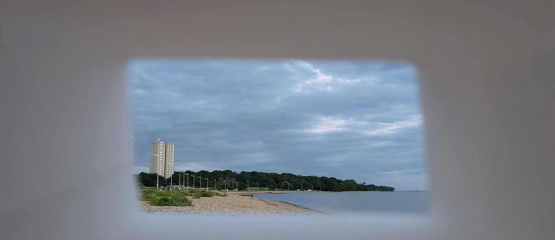 A beach through a cardboard box