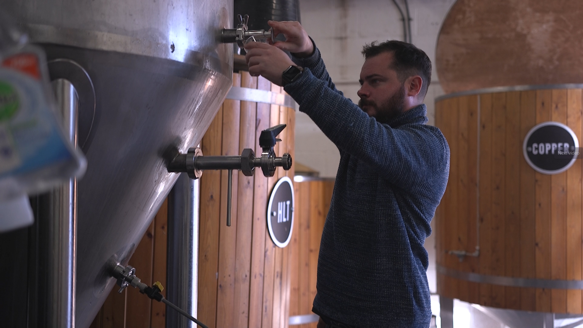 Picture shows man working in a brewery 