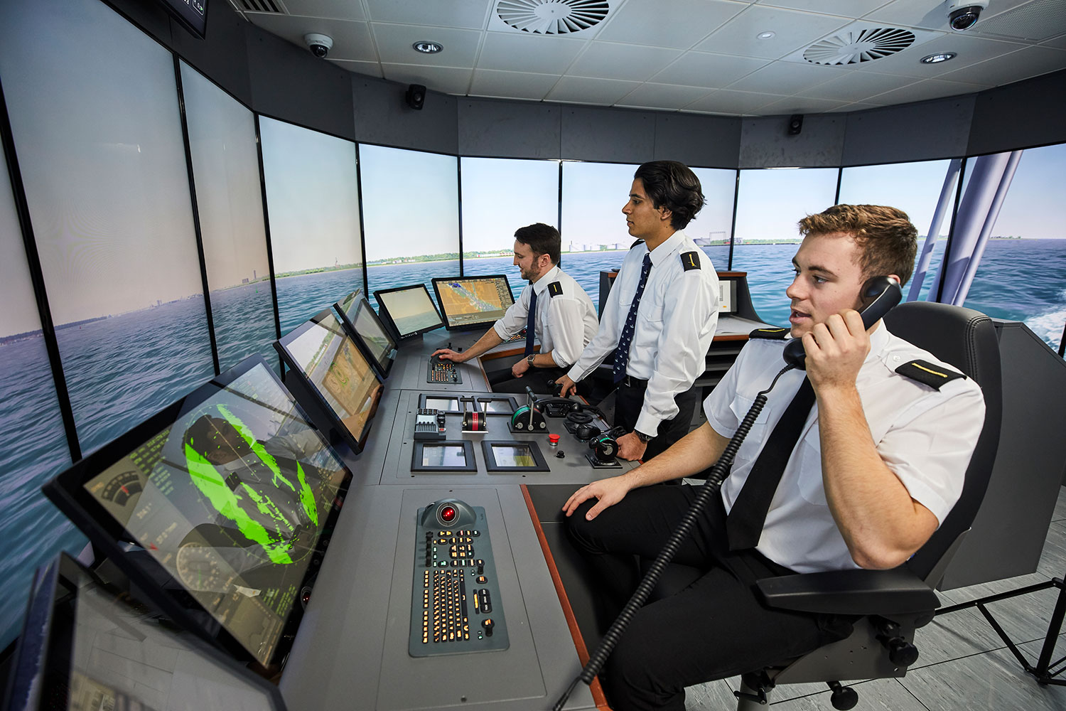 Officer cadets on the bridge in the maritime simulation centre