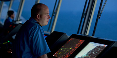 Deck officer on the bridge of a ship