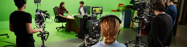 Solent media technology students filming an interview in a studio