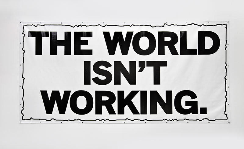 Poster that says 'The world isn't working'
