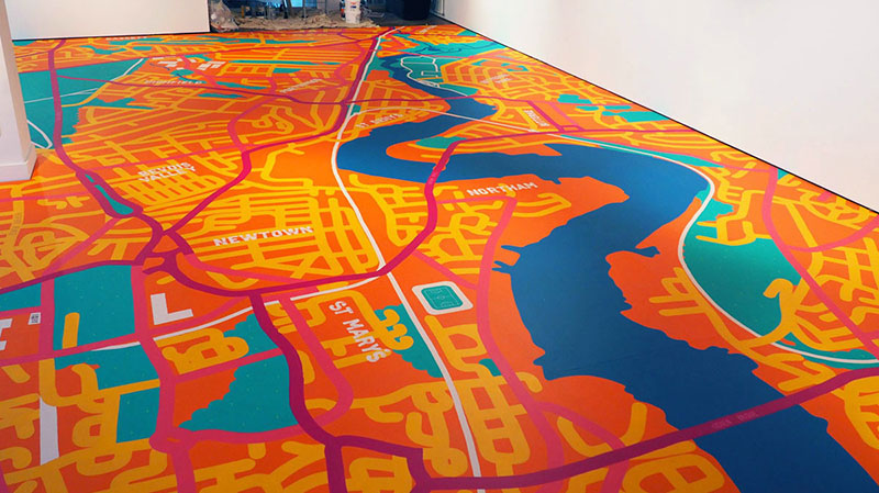 The map painted on the floor of the gallery