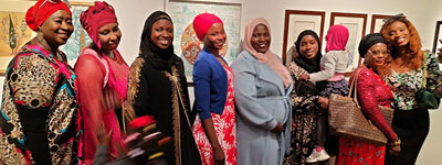 A group of women smiling at the camera