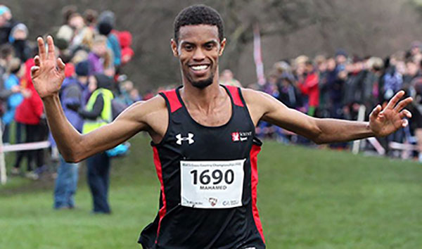 Solent athlete Mahamed Mahamed crossing the finish line at the BUCS cross country championships