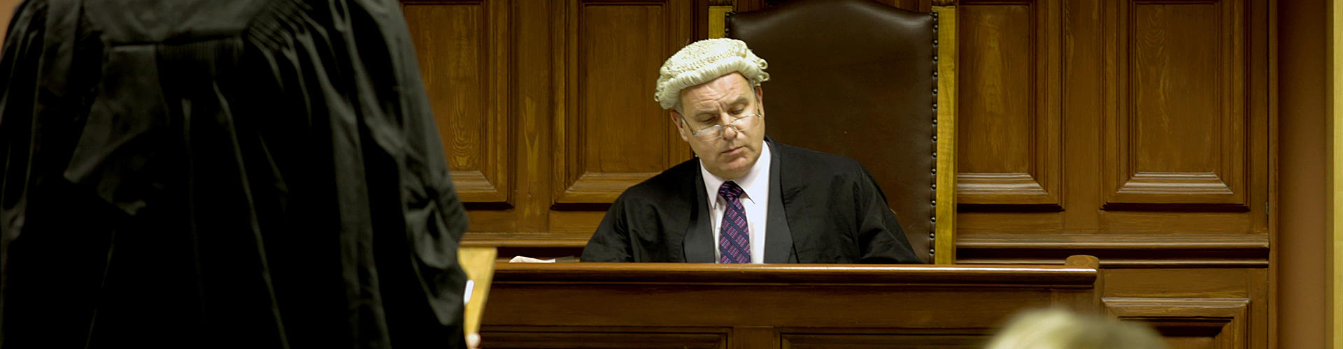 A judge said at in court, staring curiously at his desk
