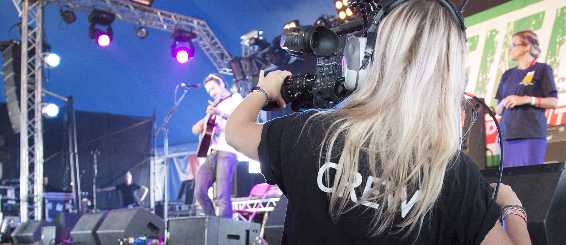 Image shows camera operator working at festival