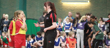 A Solent student teaching school children Physical Education.